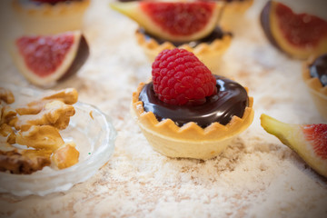 chocolate cakes and sweets and natural fruits