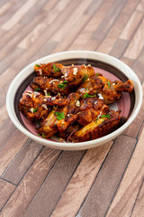 delicious fried chicken wings with sauce