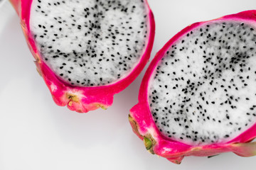 Dragon fruit. Vibrant Dragon Fruit on white background. Sliced white dragon fruit or pitaya on...