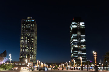 Plakat View of modern building in the night in Barcelona city in Spain.