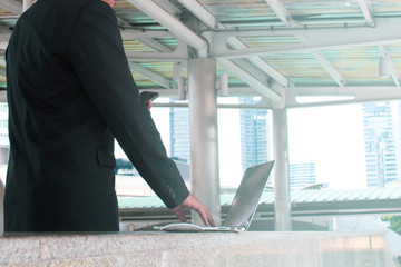 businessman and computer connect server network system online in data internet, security hacking...