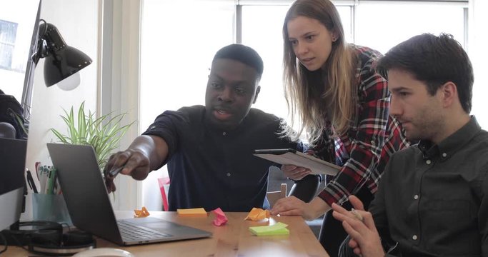 Happy employee people working together at startup office