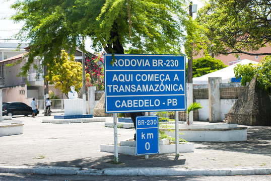 Sign in the beginning of Trans-Amazonian Highway. Translation of the sign: Road BR 230. Here begins the Trans-Amazonian. Cabedelo - PB