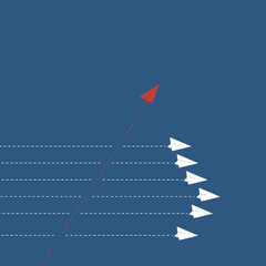 Different Approach - Different Direction. Group of paper airplane in one direction and with one individual pointing in the different way, can be used leadership/individuality/innovation concepts.