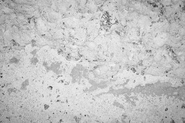 Concrete texture of old wall with scratches and cracks. Background from gray solid material.