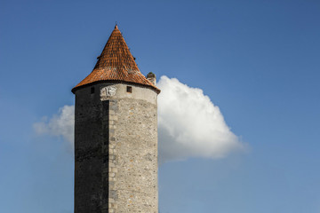 Lonely castle tower with cloud blue sky