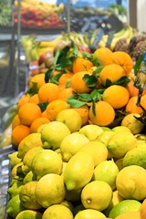 Fresh citrus fruits in supermarket. Concept of healthy food, bio, vegetarian, diet.
