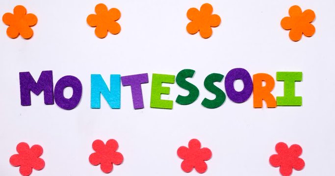 The word montessori. The word is written in dancing letters in a colorful font.