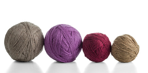 Balls of yarn in various colors. Isolated on white background.