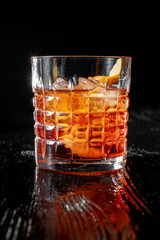 Classic Negroni cocktail isolated on black background.