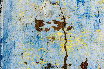 Texture of a concrete wall with cracks and scratches which can be used as a background
