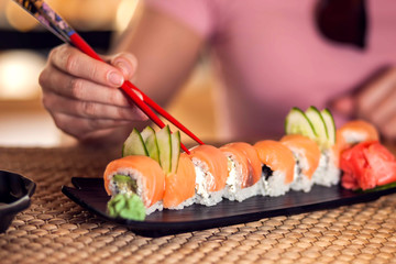 Japanese food named sushi or roll with salmon and rice.