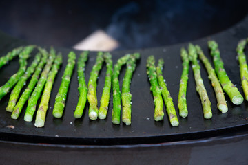 green asparagus on grill plate