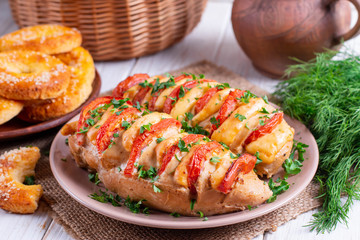 Chicken fillet baked with tomatoes and cheddar cheese
