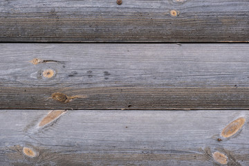 Round Log wall, old wood background. wall of wooden planks