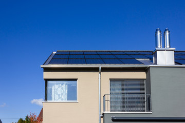 solar panel on a rooftop of a modern house