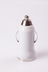 White adapter mobile phone charger on white background