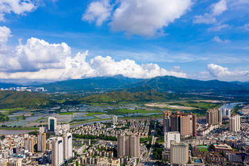an aerial view of downtown shenzhen and rural areas of hong hong china