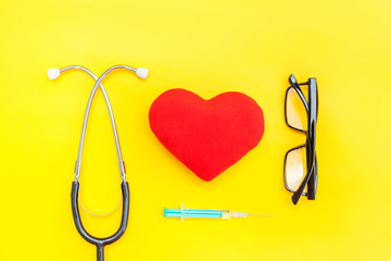 Simply minimal design medicine equipment stethoscope or phonendoscope glasses syringe red heart...