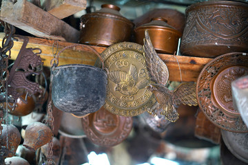 Detail of ancient objects of Greek and Arabic origin in an antique shop in the historic center of Ioannina, Epirus
