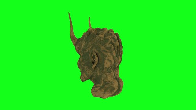 Old stone sculpture of a demon head on green screen.Lucifer statue bust rotating on chroma key. Mythology art concept. Satanist symbol. 3d animation background in 4k