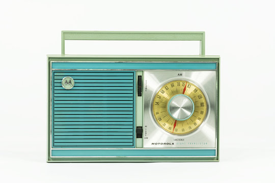Illustrative editorial photograph of old Motorola Portable Transistor Radio with white background on November 12, 2019 in Los Angeles, California, USA.