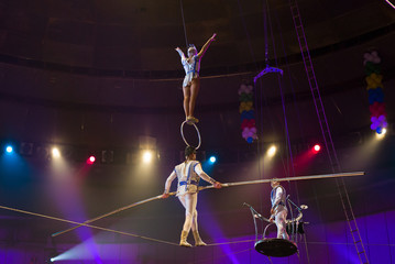 performance of aerialists in the circus arena. © Andrey