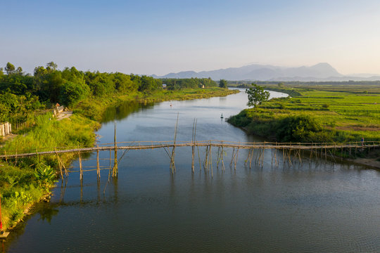 A bamboo bridge crosses a river near Hoi An, Hoi An, Quang Nam Province, Vietnam