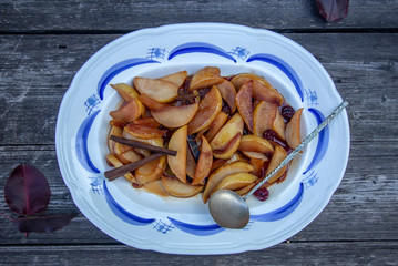 juicy tasty pears with spices in caramel
