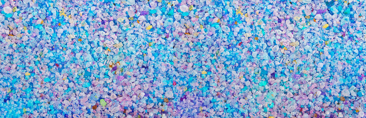 Aromatic bath salt close-up. Background and texture. Panorama.