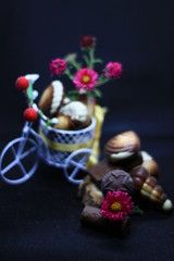 composition with chocolate and flowers