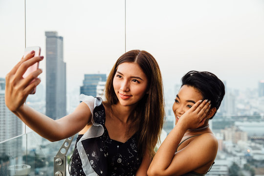 Women Taking Selfie on a Rooftop