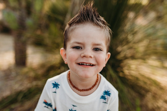 Close up portrait of cute young toddler boy smiling - Powered by Adobe