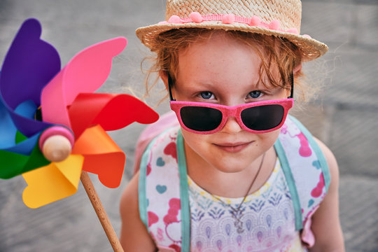 Cute child with pinwheel