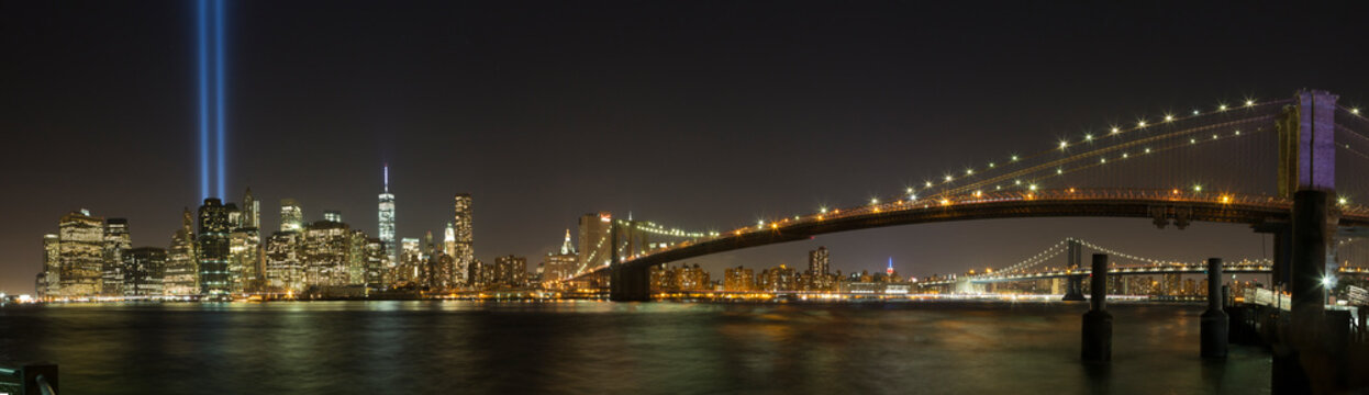 New York City skyline and 9/11 Memorial night panoramic.