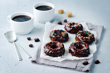 Baked chocolate doughnuts with chocolate glaze