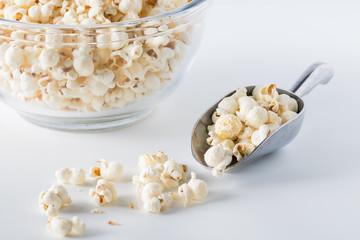 Scoop of white cheddar popcorn.