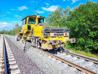 Heavy machinery repairs rail lines