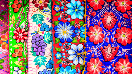 Fototapeta na wymiar Colorful clothes at a Tarabuco traditional market, Bolivia