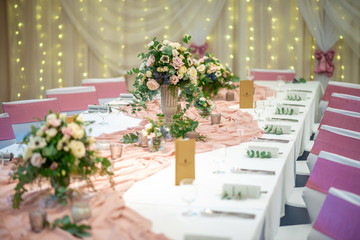 wedding table with flowers and decorations, wedding centerpiece or event reception 