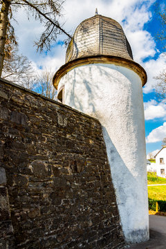 Castle Wallerode round tower of the revetment wall at the Belgian village of Wallerode