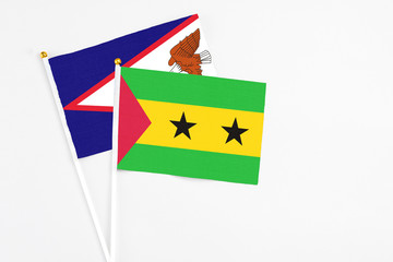 Sao Tome And Principe and American Samoa stick flags on white background. High quality fabric,...