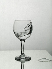 Splash of water in a wine glass