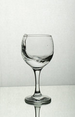 Splash of water in a wine glass