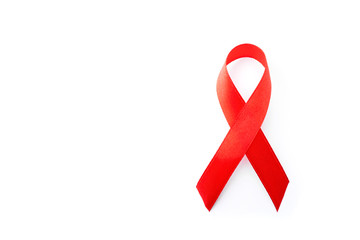 World aids day symbol. Awareness red ribbon isolated on white background. 1st December. Cancer symbol, top view with space for text