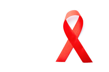 World aids day symbol. Awareness red ribbon isolated on white background. 1st December. Cancer symbol, top view with space for text