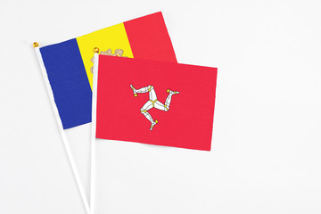 Isle Of Man and Andorra stick flags on white background. High quality fabric, miniature national...