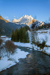 Winter brook in Italian Dolomites
