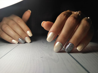 Pearl gel polish with rhinestones and silver sprinkles. Pearl design on iridescent coating on long...