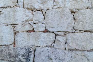 Stone wall, old white stones background